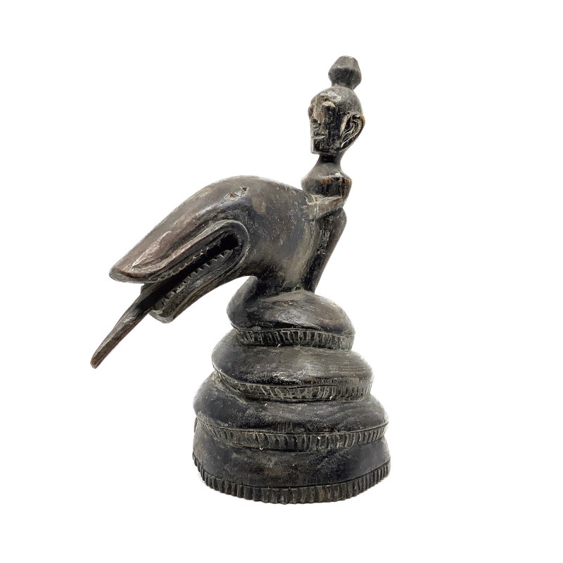 Statue primitive en bois homme chevauchant un serpent