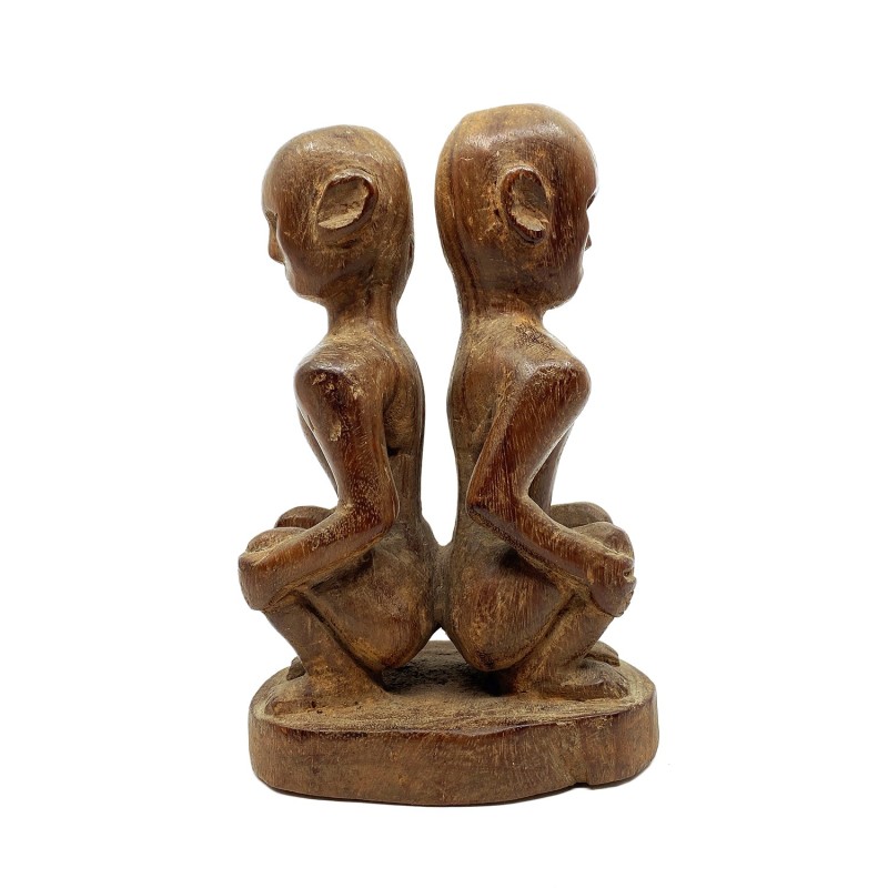 Statue primitive double personnages accroupis dos à dos  bois sculpté Dayak Bornéo