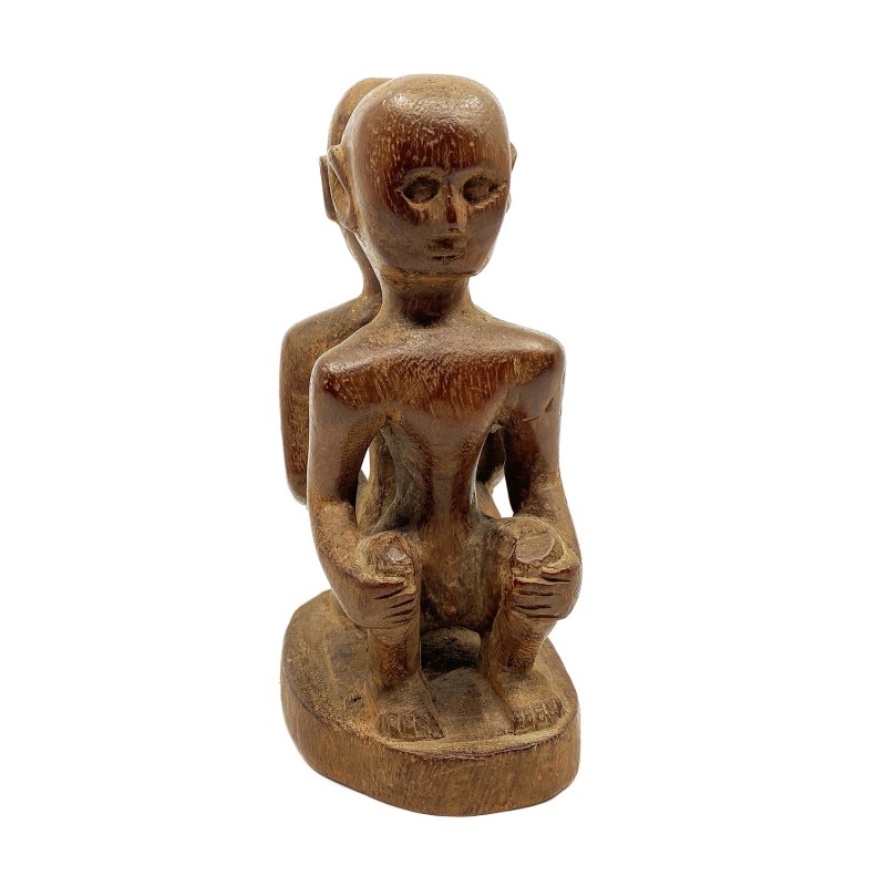 Statue primitive double personnages accroupis dos à dos  bois sculpté Dayak Bornéo