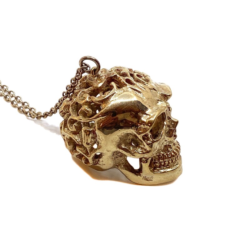 Pendentif crâne tête de mort ajouré en laiton doré