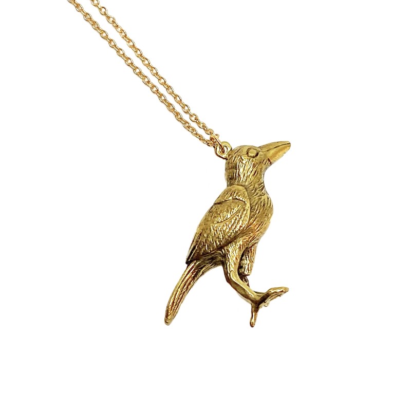 Pendentif corbeau bi-face  façon Mémento Mori en laiton doré