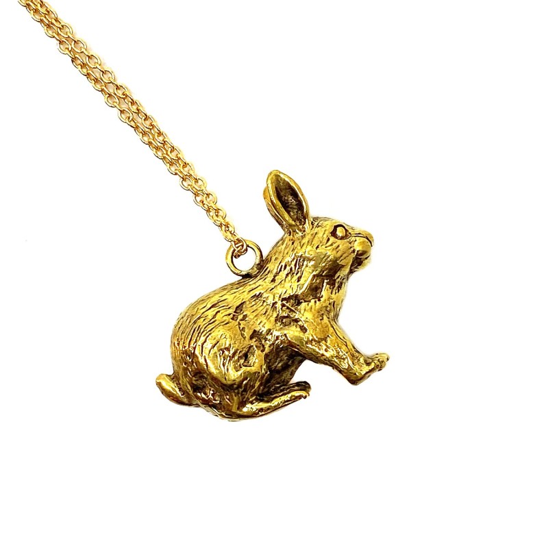 Pendentif lapin bi-face façon Mémento Mori en laiton doré